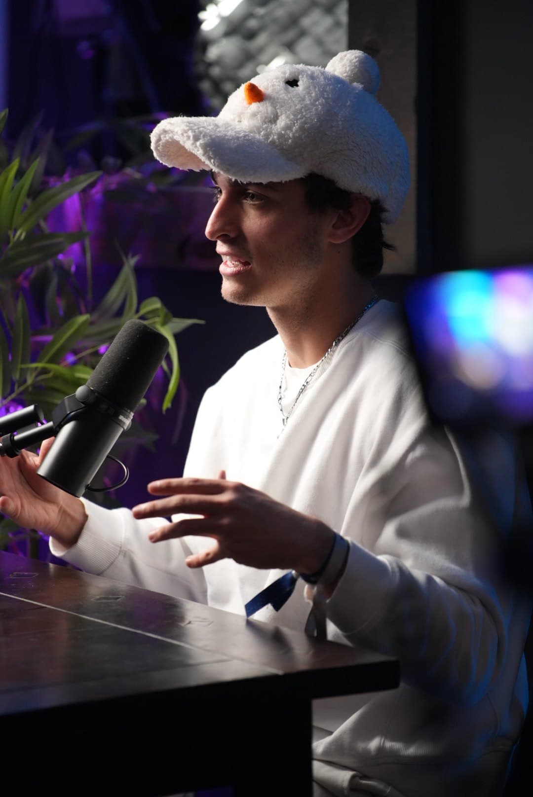 A lighthearted moment behind the mic