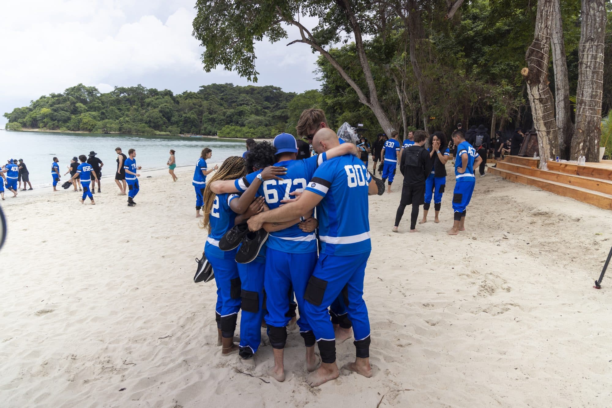Gathered on the island beach where two girls were baptized